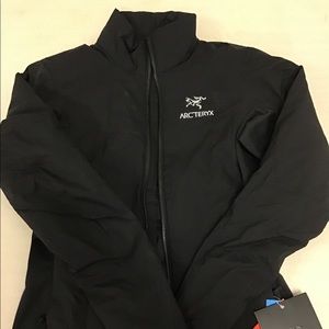Women’s (BNWT) Arcteryx and The North Face tops.